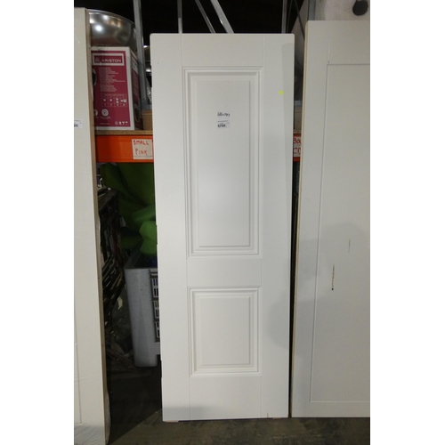 5799 - 1 x white door approx 686 x 1981mm. Please note that this door has been fitted before (holes cut for... 