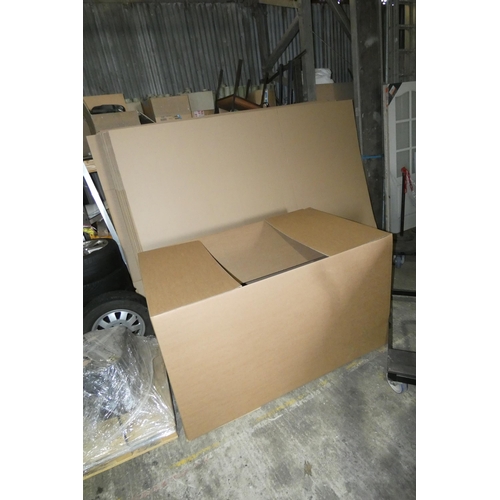 5853 - A quantity of approx 40 x large flat packed cardboard boxes, each approx 102 x 165 x 93cm high when ... 