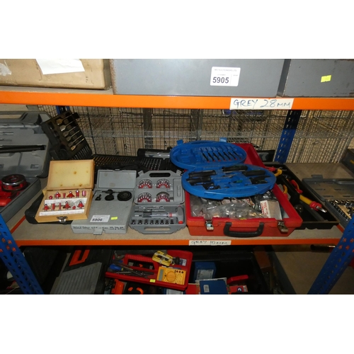 5906 - A quantity of various tools including screwdrivers, drill bits, 2 x hole saw sets, router bits etc. ... 