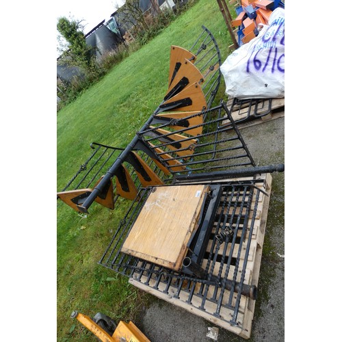 6005 - A metal framed spiral staircase with wooden steps measuring approximately 324 cm high x 140 cm wide ... 