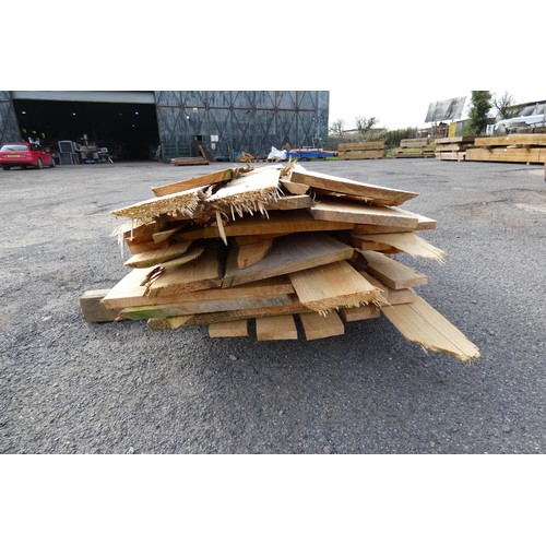 6025 - A quantity of waney edge board measuring up to approx 250 cm long - top stack - believed to be Cedar