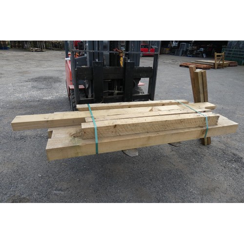 6038 - A quantity of timber to include 10 cm x 10 cm, 14 cm x 10 cm, 15 cm x 7.5 cm lengths vary up to appr... 