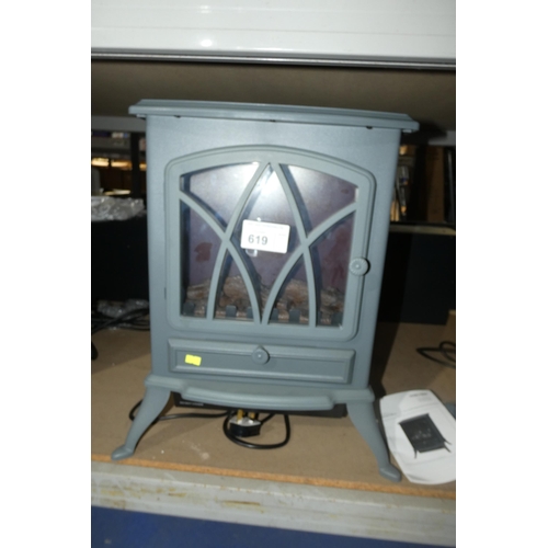 619 - An electric fire / wood burner effect in grey by Warmlite retail approx £95 - boxed - trade