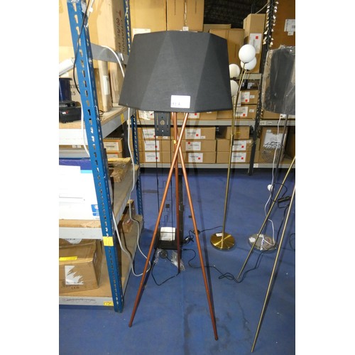 197A - 1 x copper coloured tripod floor standing lamp supplied with a shade