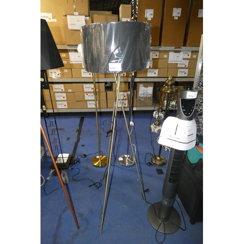 197B - 1 x brass coloured tripod floor standing lamp supplied with a shade