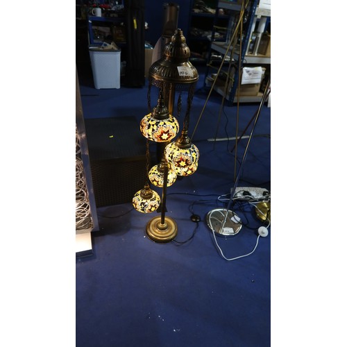 197G - A metal floor standing lamp with 5 x decorative glass mosaic shades. Please note that the bottom sha... 