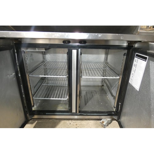 1009 - A commercial stainless steel 2 door bench fridge by Foster type PRO1/2H with wide prep table top, ap... 