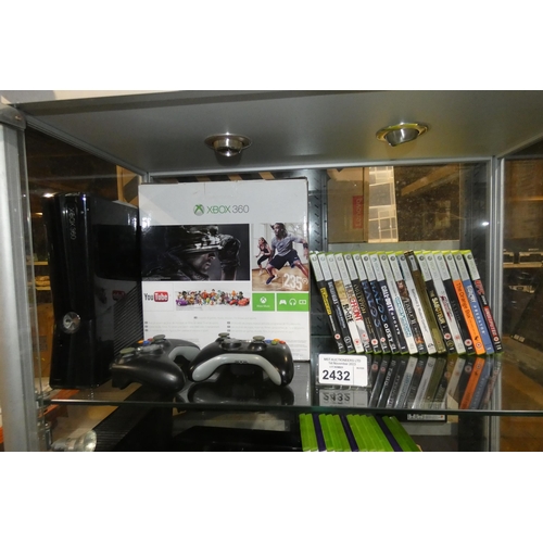 2432 - An Xbox 360 game console with 2 controllers and 18 games rated 15/16 comes with a box, please see pi... 