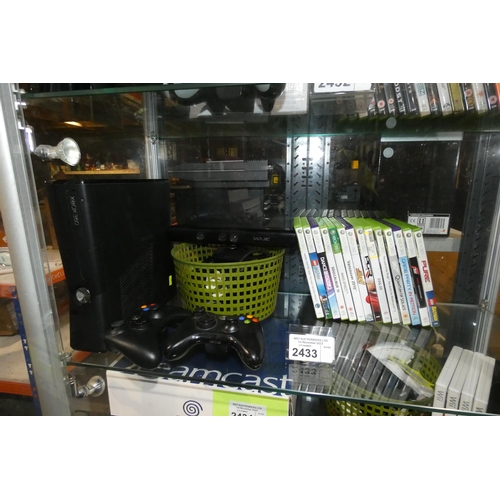 2433 - An Xbox 360 game console with 2 controllers, Kinect and 14 games rated 3-12, please see pictures for... 