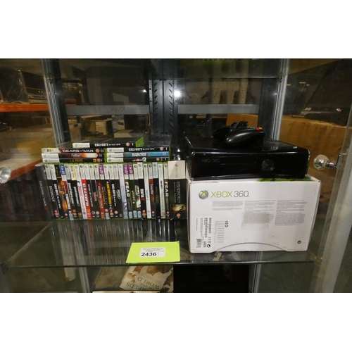 2436 - An Xbox 360 game console with 1 controller and 33 games rated 18 comes with a box, please see pictur... 