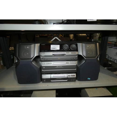 2441 - A Sony stereo system with minidisc cd changer and cassette, comes with speakers - trade