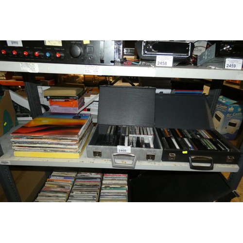 2460 - A quantity of various vinyl records and cassettes, please see pictures for more details, contents of... 