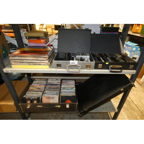 2460 - A quantity of various vinyl records and cassettes, please see pictures for more details, contents of... 