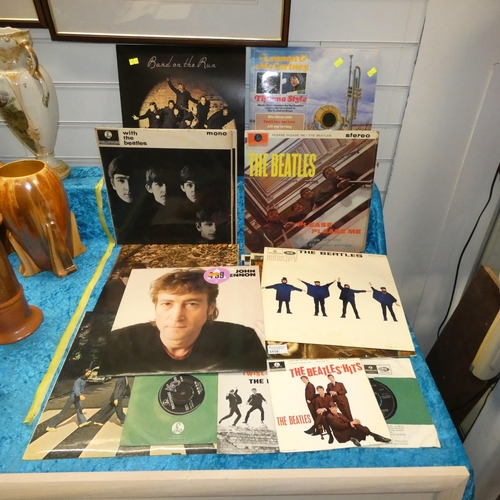 3118 - A collection of vintage LP records and single records mainly by The Beatles including; Rubber Soul, ... 