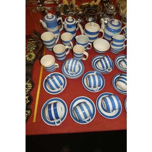 3190 - A large quantity of blue and white Cornish ware plates, jugs, beakers, cups, saucers and other china... 