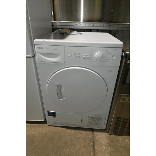 1205 - An under counter condenser tumble dryer by Beko type DSC85W - trade Tested Working