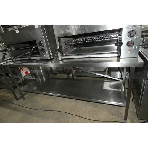 1232 - A commercial stainless steel catering type table with shelf beneath, please note this has been used ... 