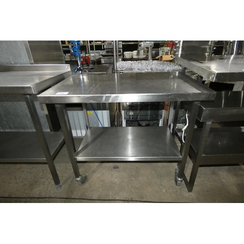 1234 - A commercial stainless steel mobile catering type table with shelf beneath approx 98x60cm