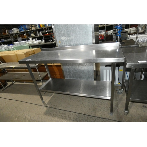 1235 - A commercial stainless steel catering type table with shelf beneath approx 145x60cm