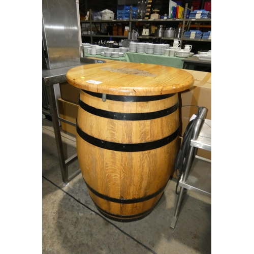 1237 - A branded Magners cider wooden barrel table