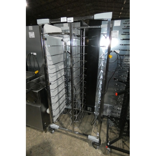 1268 - A commercial stainless steel 24 grid tray rack type Cidelroll