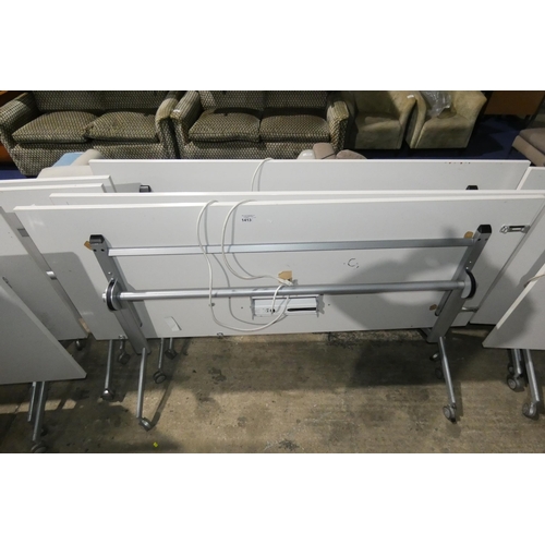 1413 - 3 x white tipping top wheeled tables each with cable management sockets in middle of table and each ... 