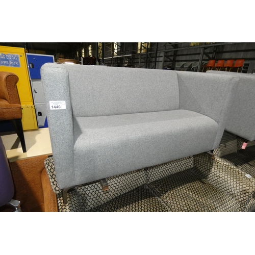 1440 - A Frovi two person grey felt reception type sofa approx 135cm wide