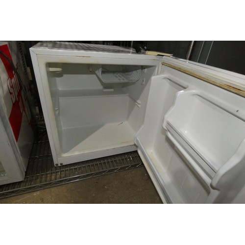 1217 - A counter top fridge by Haier - trade Tested Working