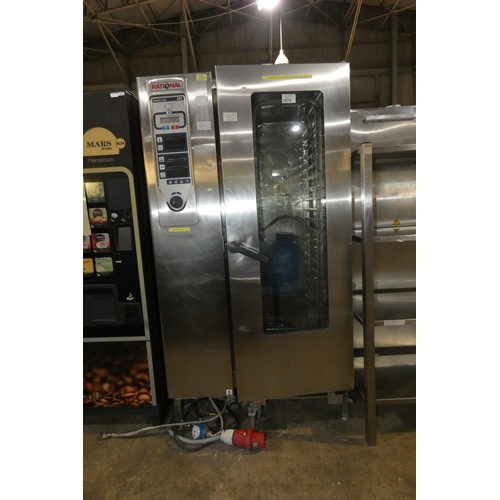 1275 - A commercial stainless steel 20 grid combi oven by Rational type CPC201, comes with filter and troll... 