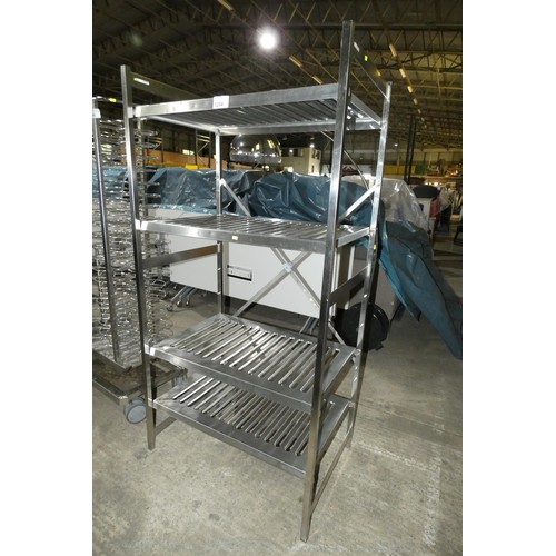 1294 - A commercial stainless steel catering type rack with 4 slotted shelves approx 90x62x188cm