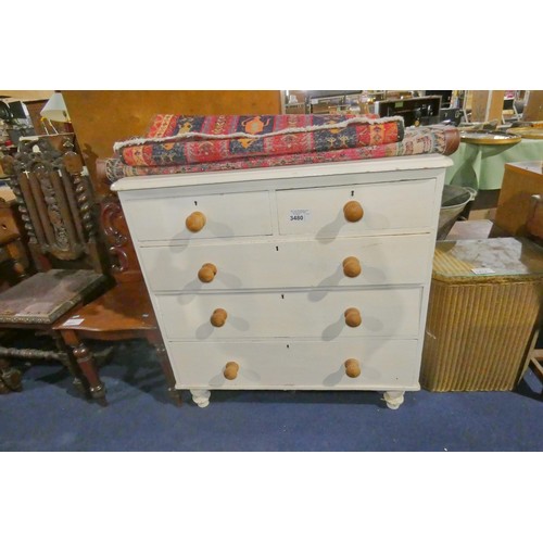 A vintage white painted pine chest of two short and three long drawers
