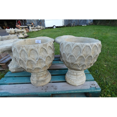 1309 - A pair of concrete pineapple style concrete planters