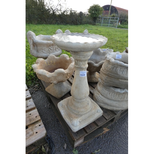 1338 - A tall round concrete bird bath