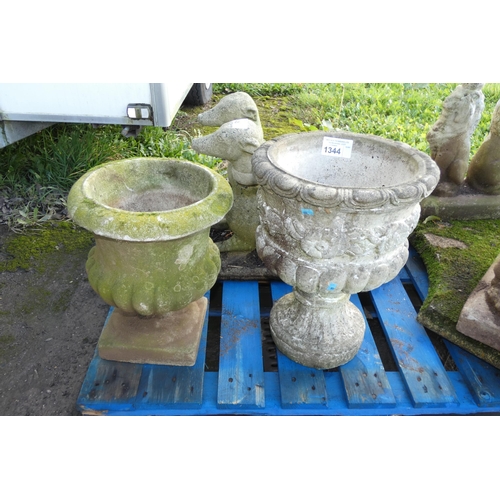 1344 - 2 various round concrete planters