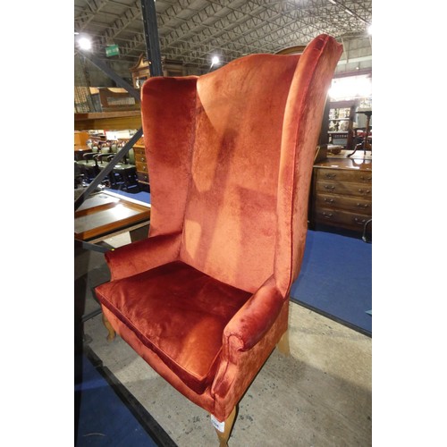 1594 - A vintage Howard and Sons style wingback high back armchair upholstered in burnt orange velour fabri... 