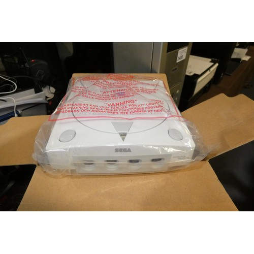 2434 - A boxed Sega Dreamcast console, unused, box has been opened to check contents - trade