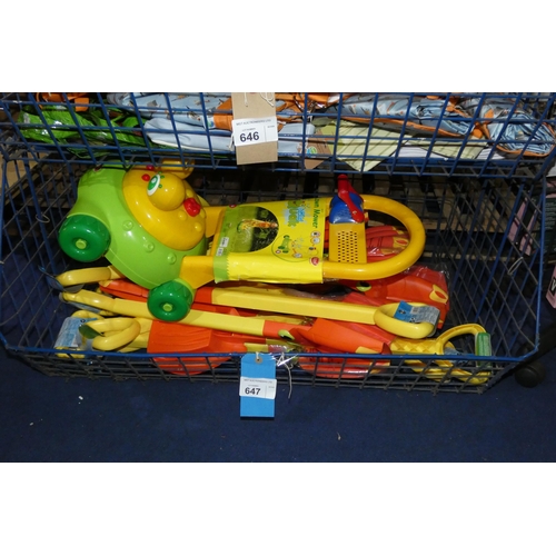 647 - A quantity of various toys including beach spades & a lawn mower