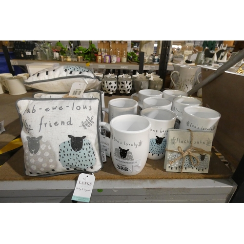 388 - A quantity of sheep decorated mugs, cushions etc