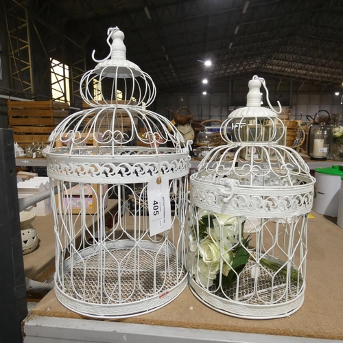 405 - A large and medium decorative metal hanging cage