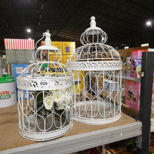 406 - A large and medium decorative metal hanging cage