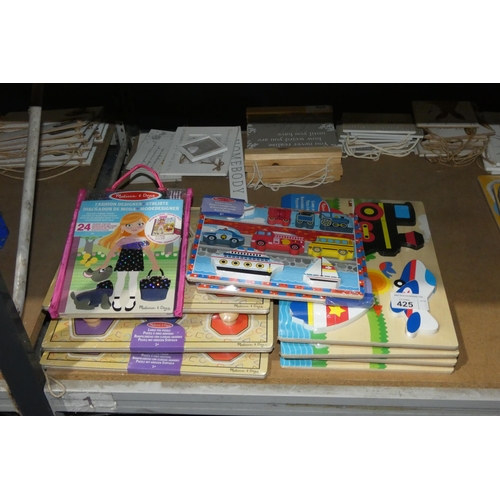 425 - A quantity of various wooden toys, puzzles etc