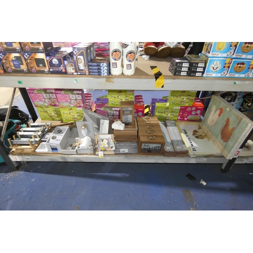 448 - A quantity of various wooden gift items including signs, money boxes etc, contents of 1 shelf