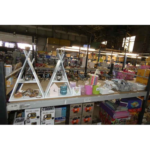 455 - A quantity of various gift items including candles, wooden signs, 4 x triangular shelving units etc,... 