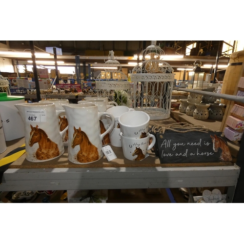 467 - A quantity of various equine related items including water jugs, mugs & signs
