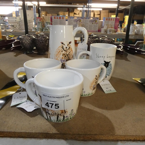 475 - A water jug and 4 mugs with various sheep designs