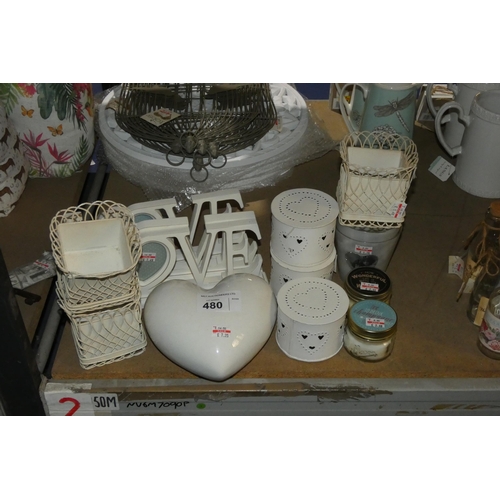 480 - A quantity of various gift items including candle holders, candles, photo frames etc