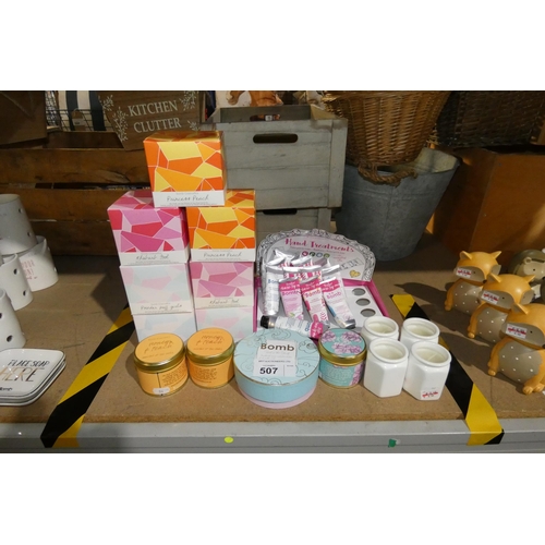 507 - A quantity of various bath bombs, candles etc