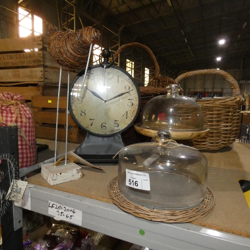 516 - 2 glass display cloches, a clock and an ornamental bird