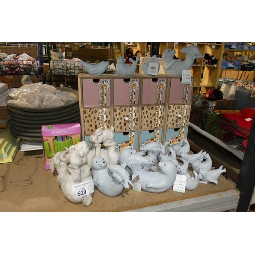 520 - A quantity of various gift related items including seal and rabbit figurines, drawer units etc conte... 