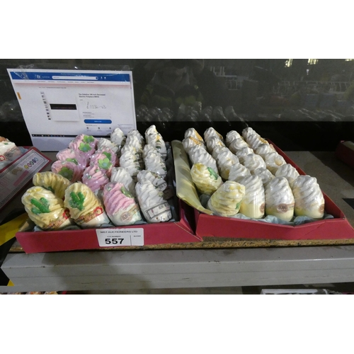 557 - 2 x cardboard trays containing a quantity of bath bombs